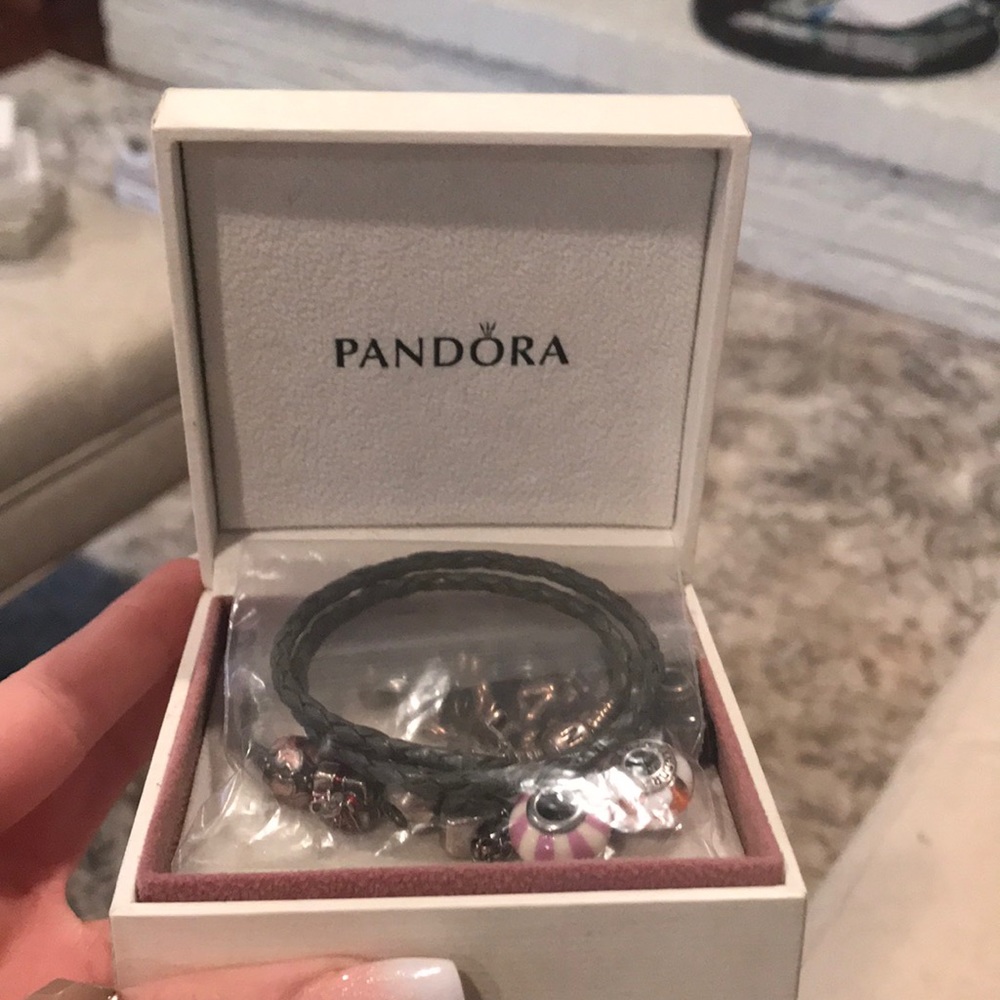 Pandora braided bracelet with charms